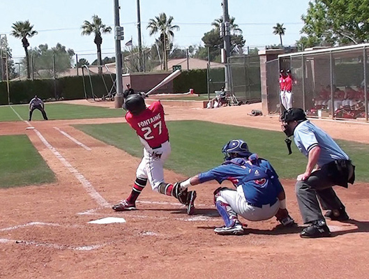 baseball camp hitter Lachlan Fontaine hitting